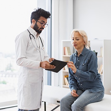 Female patient consulting with physician