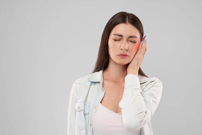 Woman with ear pain