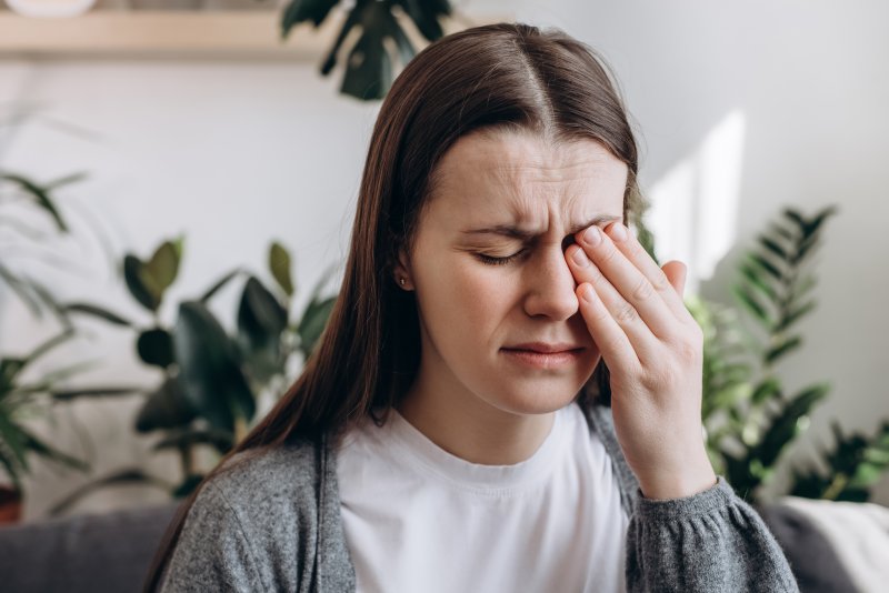 Woman with eye pain